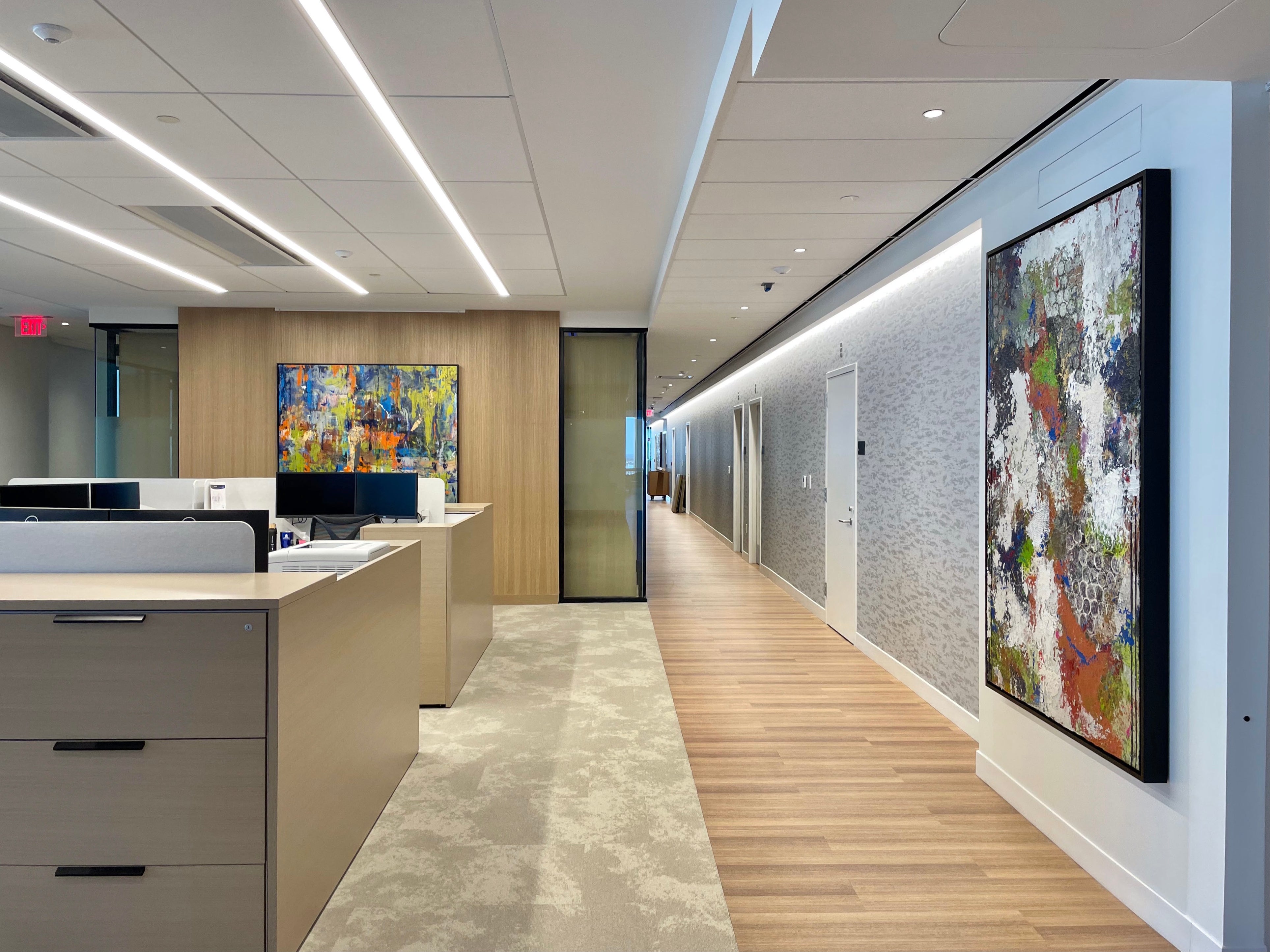 Two pieces by Yvete hang in an open office space on the executive floor. 